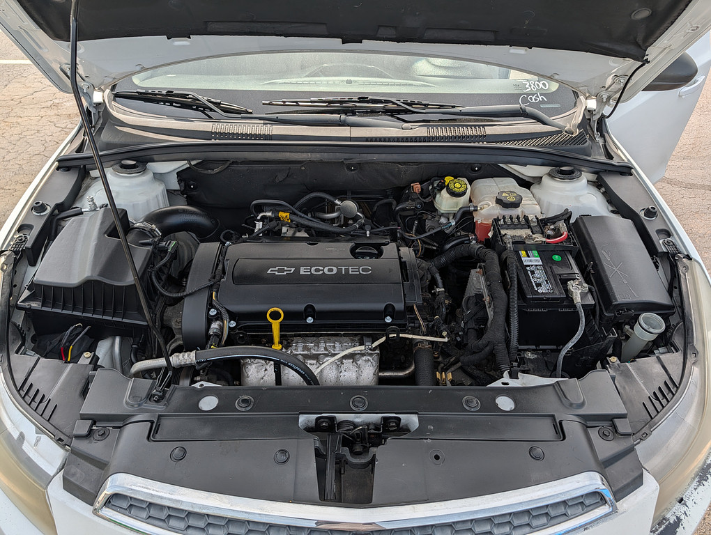 2012 Chevrolet CRUZE Located at Circus Auto Sales slide-image