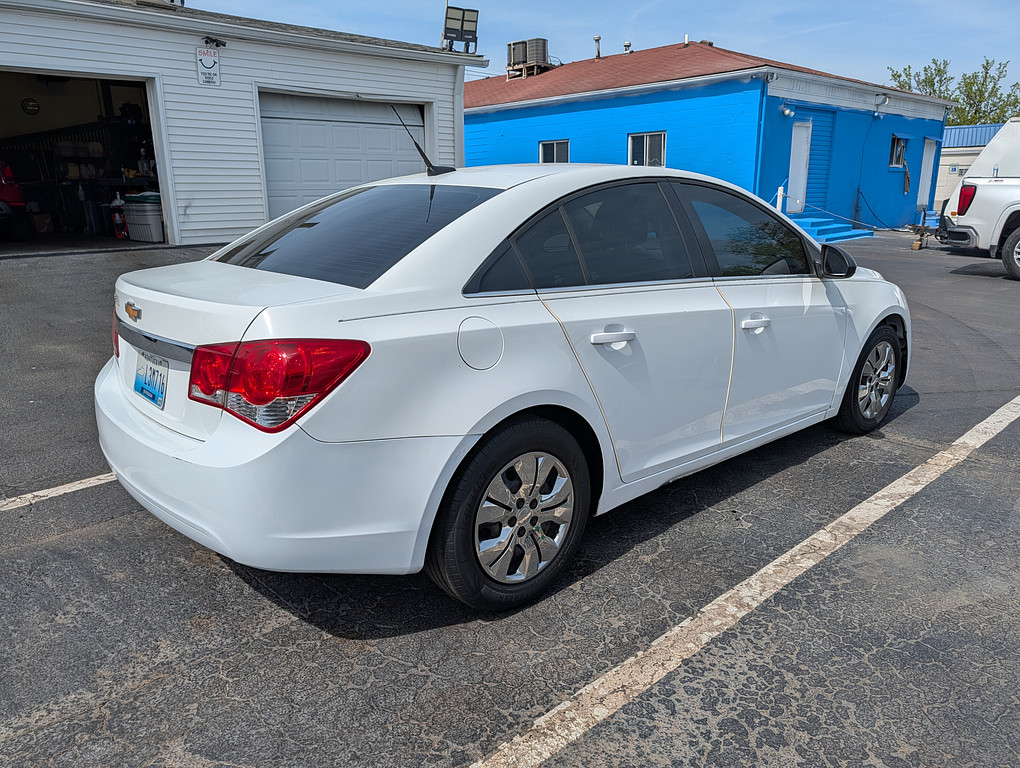 2012 Chevrolet CRUZE Located at Circus Auto Sales slide-image