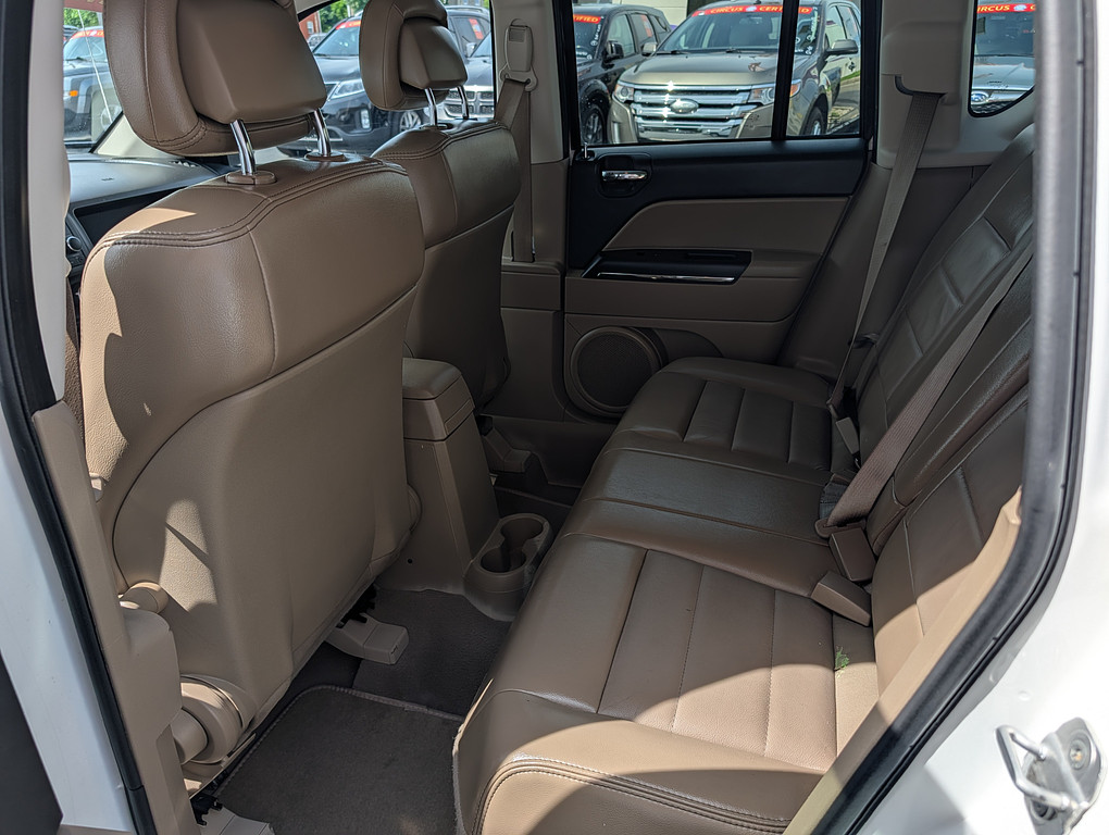 2011 Jeep COMPASS LIMITED Located at Circus Auto Sales light-box-slides