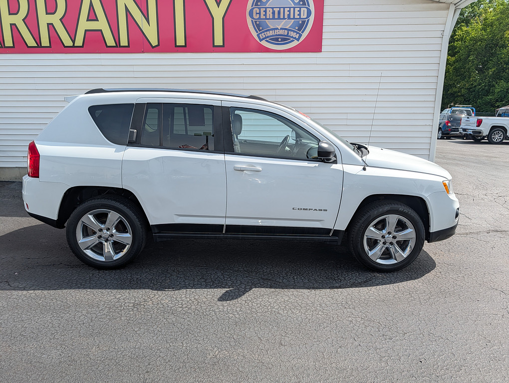 2011 Jeep COMPASS LIMITED Located at Circus Auto Sales light-box-slides
