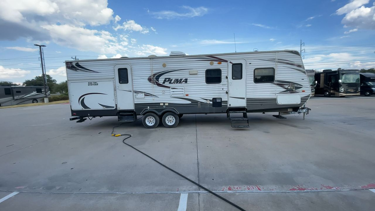 2014 FOREST RIVER PUMA 31BHSS