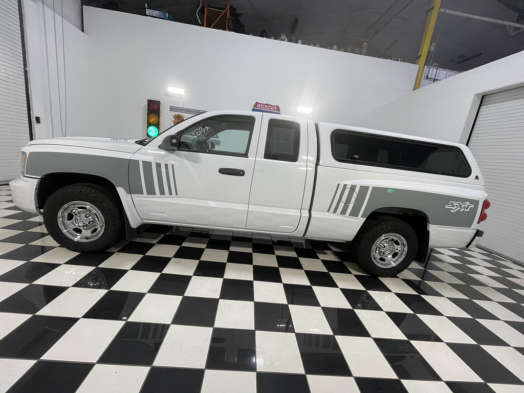 2011 Dodge DAKOTA Located at Dave's GreenLight Auto Sales light-box-slides