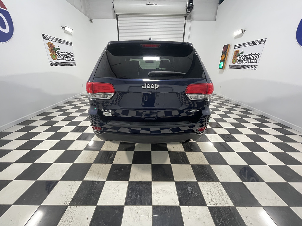 2016 Jeep GRAND CHEROKEE LARED Located at Dave's GreenLight Auto Sales light-box-slides