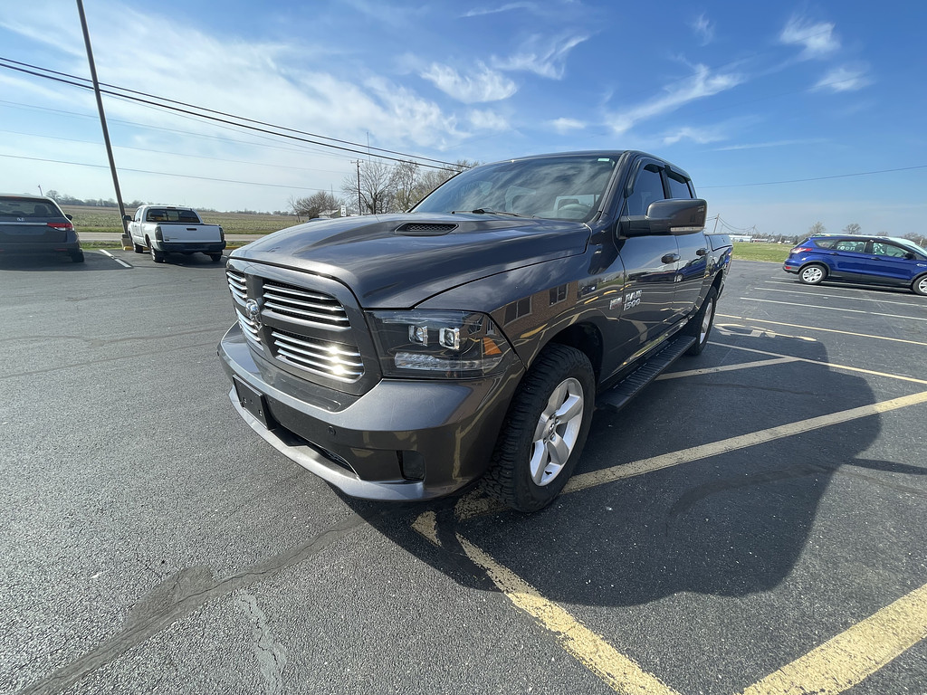 2014 RAM 1500 SPORT Located at Dave's GreenLight Auto Sales light-box-slides