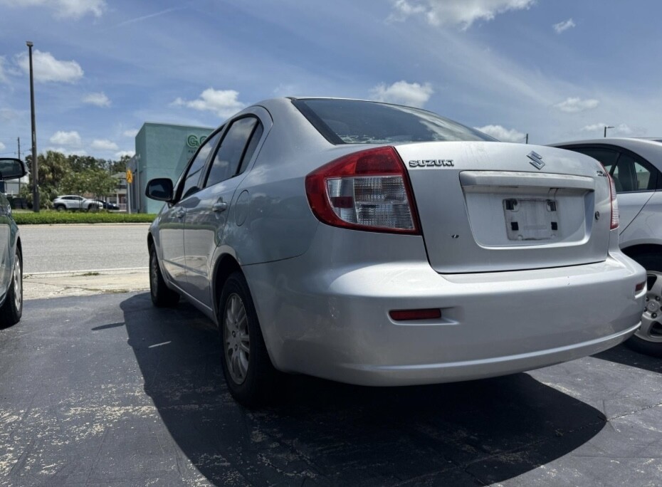 2012 Suzuki SX4 Located at Drive Smart slide-image