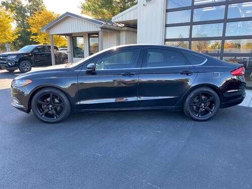 2017 Ford FUSION Located at Curtis Auto Sales Avon slide-image