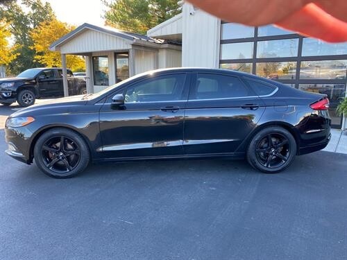 2017 Ford FUSION Located at Curtis Auto Sales Avon slide-image