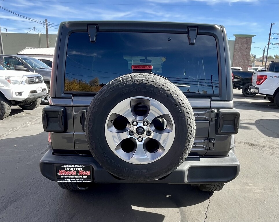 2021 Jeep Wrangler Located at Wheels West light-box-slides