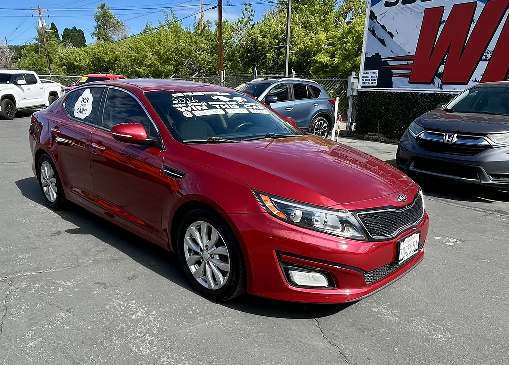2014 Kia Optima Located at Wheels West slide-image