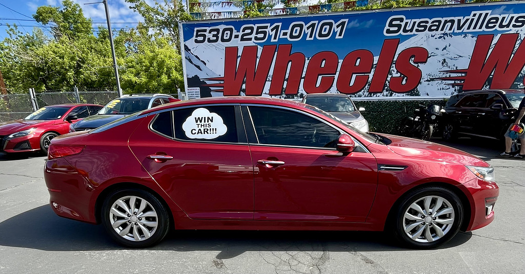 2014 Kia Optima Located at Wheels West light-box-slides