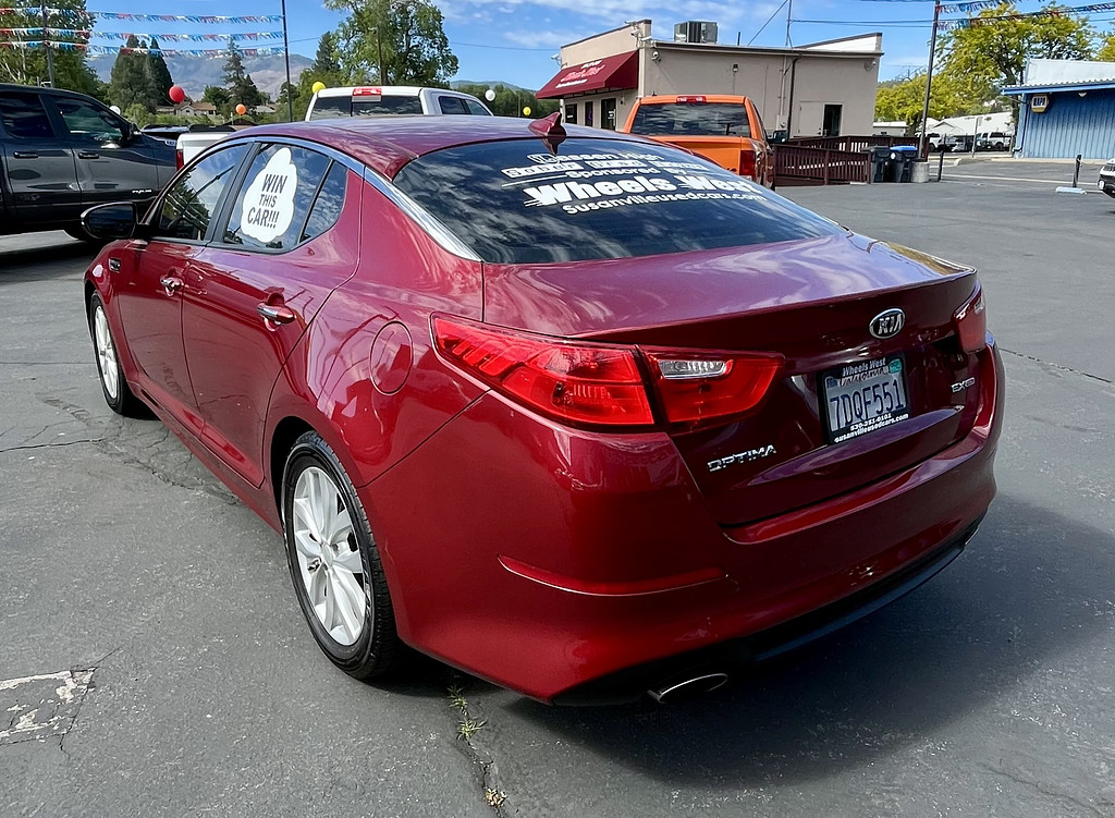 2014 Kia Optima Located at Wheels West light-box-slides