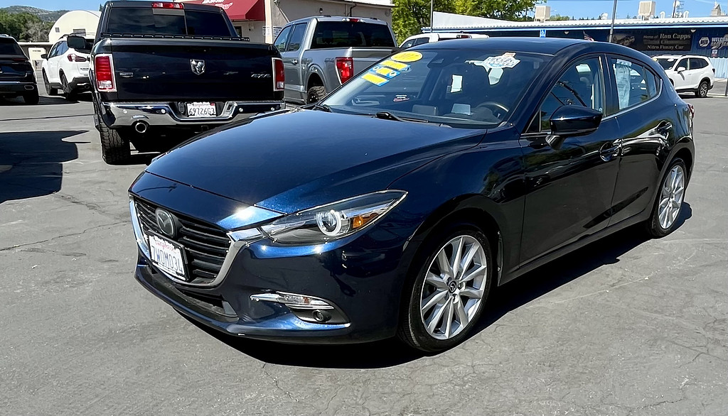 2017 Mazda Mazda3 5-Door Located at Wheels West slide-image