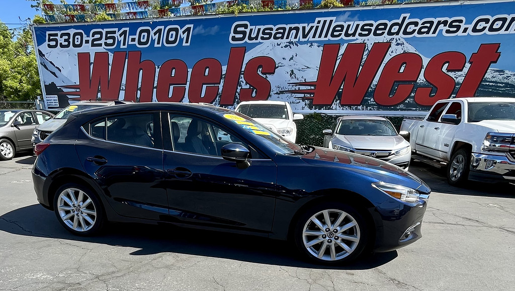2017 Mazda Mazda3 5-Door Located at Wheels West light-box-slides