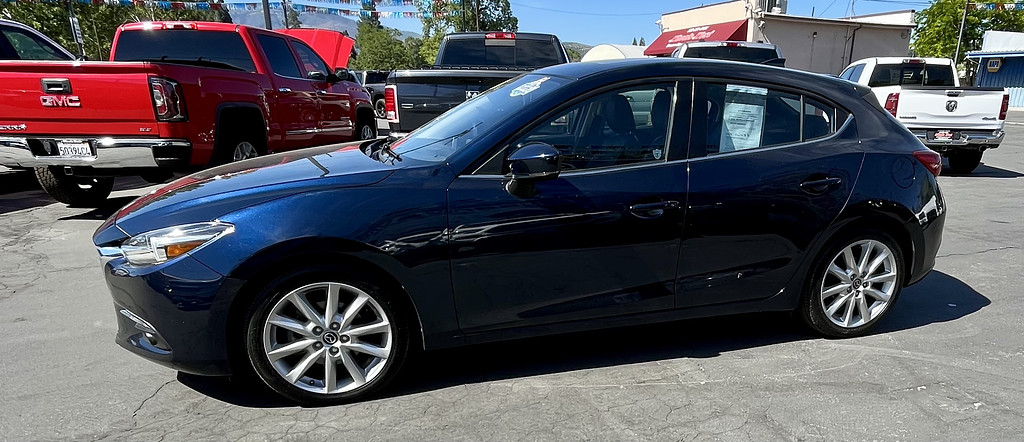 2017 Mazda Mazda3 5-Door Located at Wheels West light-box-slides