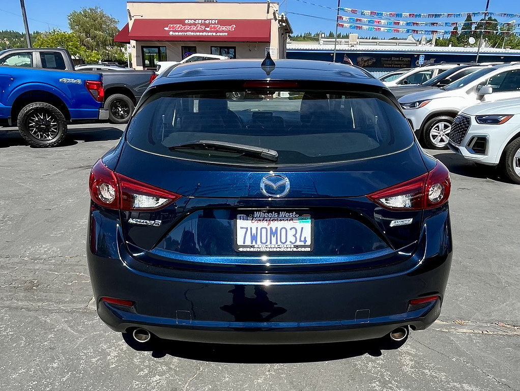 2017 Mazda Mazda3 5-Door Located at Wheels West light-box-slides