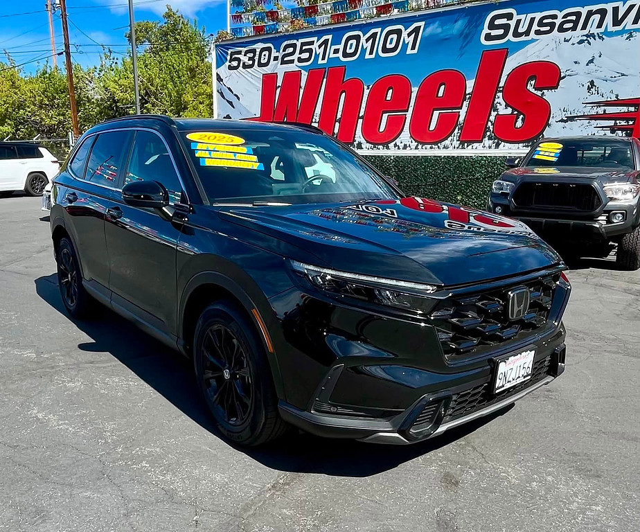 2025 Honda CR-V Hybrid Located at Wheels West light-box-slides