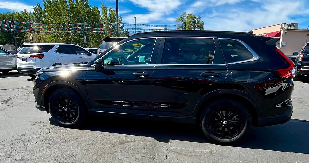 2025 Honda CR-V Hybrid Located at Wheels West light-box-slides