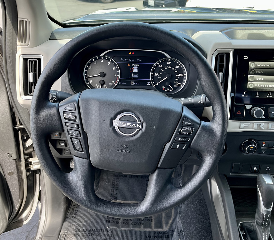 2025 Nissan Frontier Located at Wheels West light-box-slides