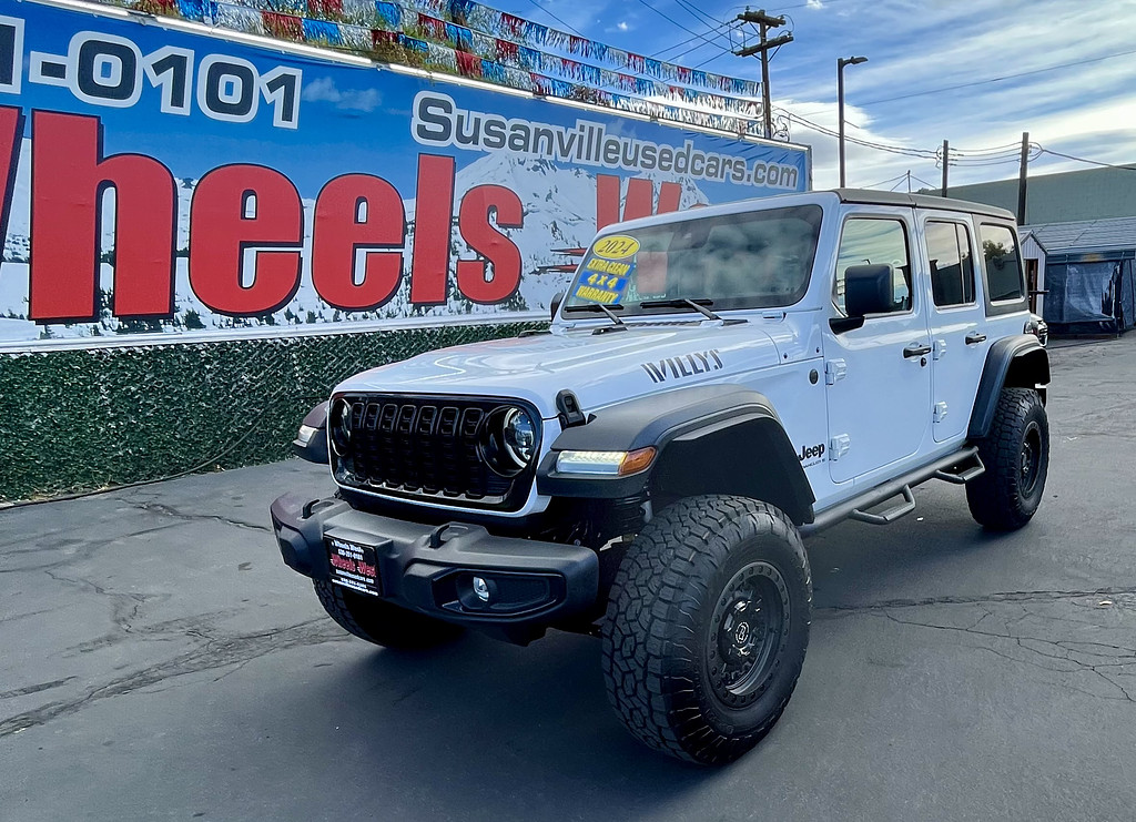 2024 Jeep Wrangler Located at Wheels West light-box-slides
