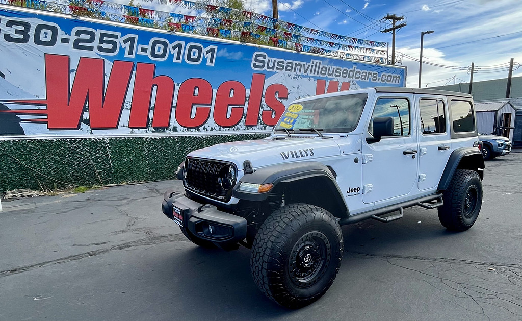 2024 Jeep Wrangler Located at Wheels West light-box-slides
