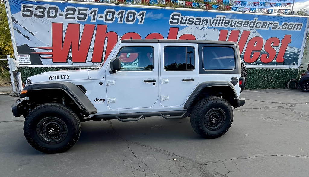 2024 Jeep Wrangler Located at Wheels West light-box-slides