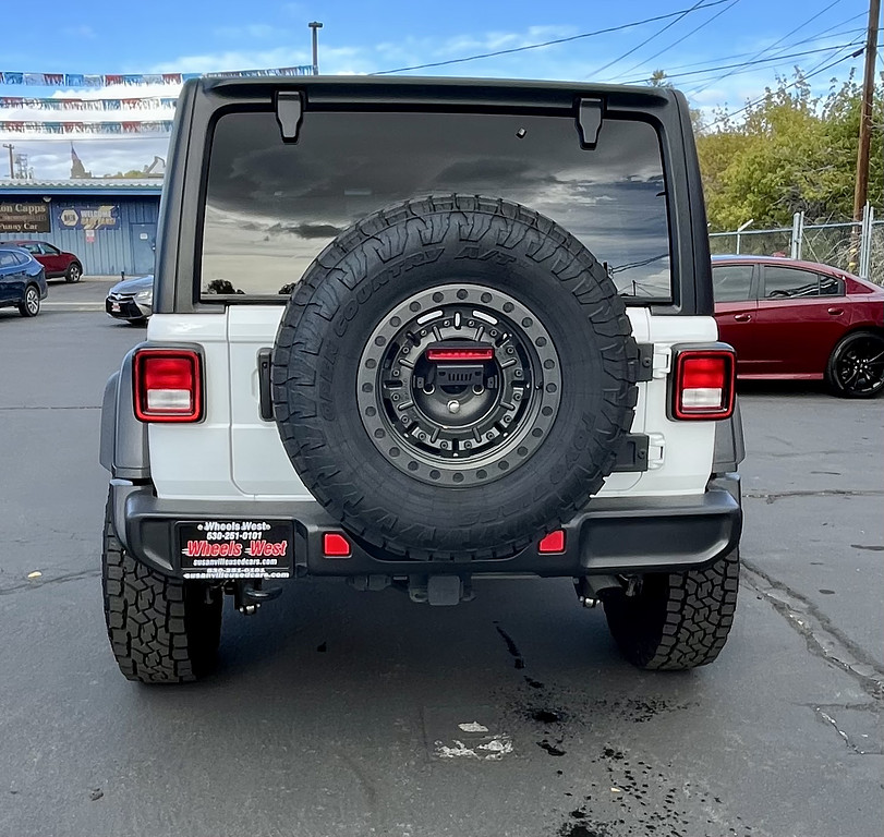 2024 Jeep Wrangler Located at Wheels West light-box-slides