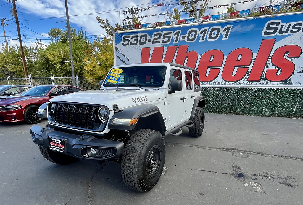 2024 Jeep Wrangler Located at Wheels West light-box-slides