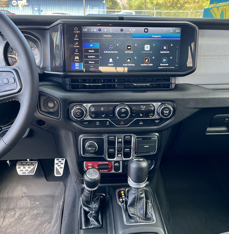 2024 Jeep Wrangler Located at Wheels West light-box-slides