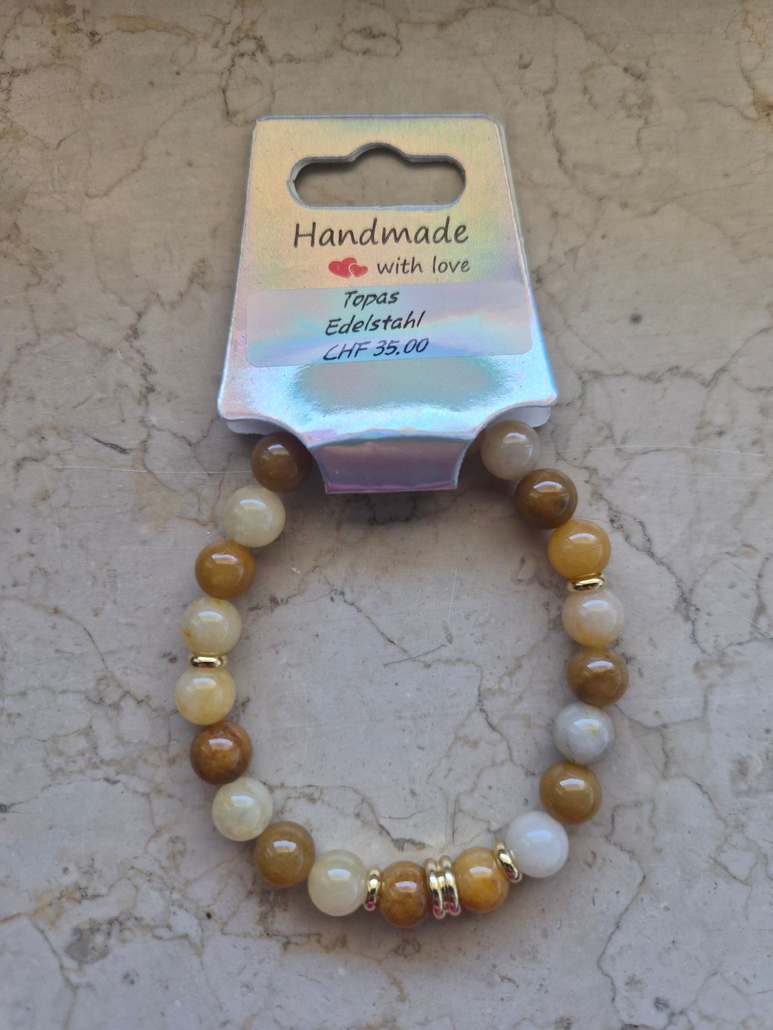 Topas mit Edelstahl gold