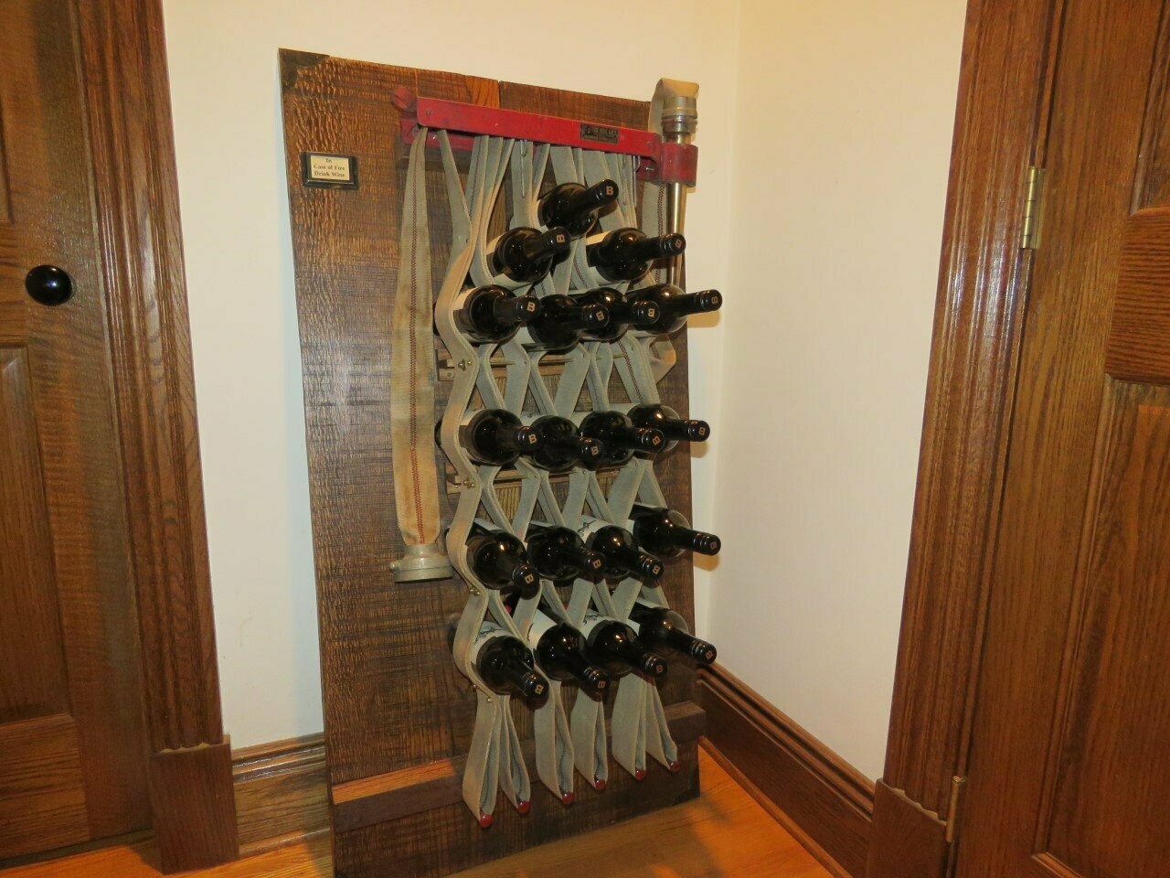 Antique Emergency Fire Hose Wine Rack