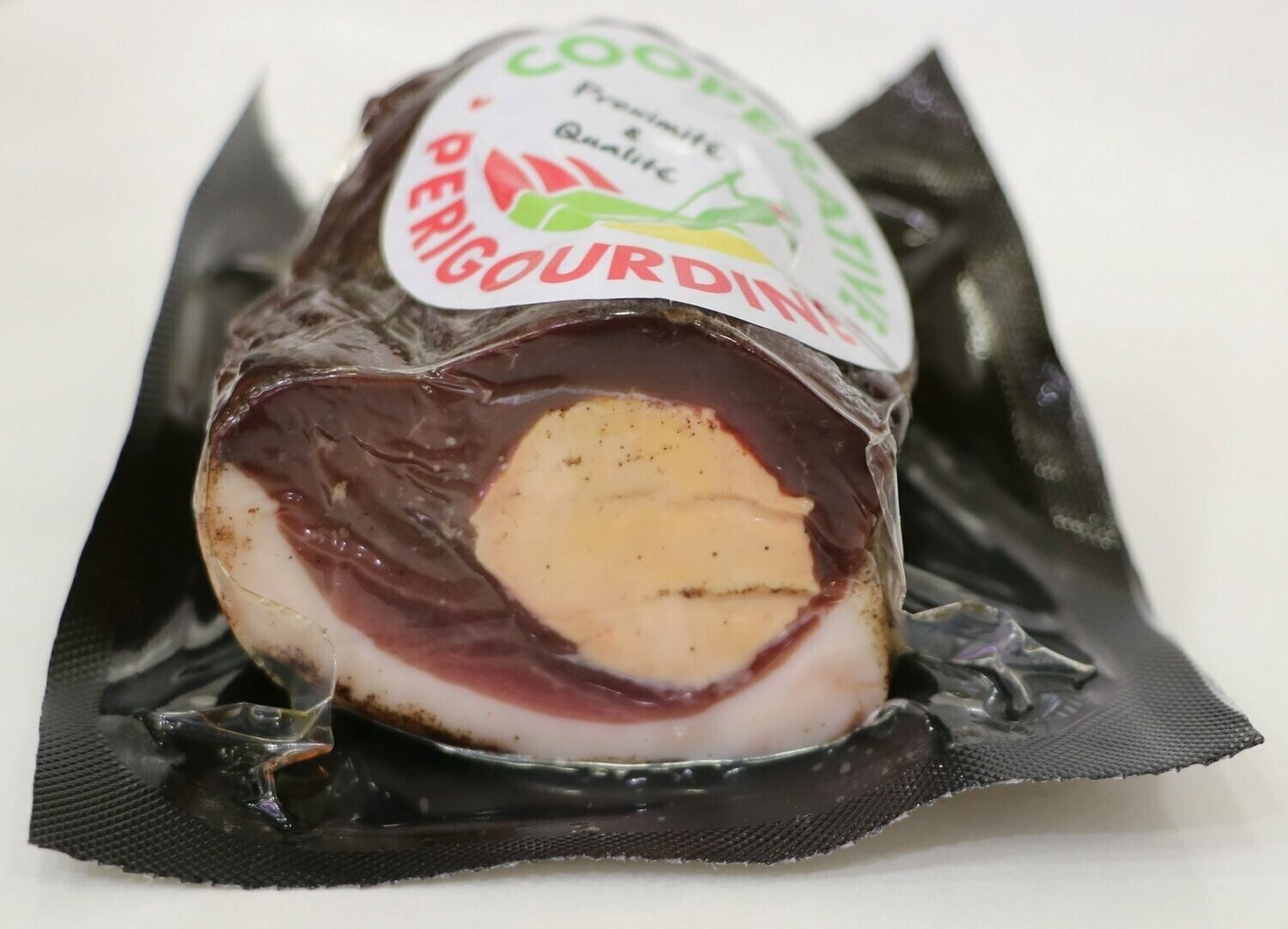 1/2 Magret de canard fourré au foie gras et poivre.