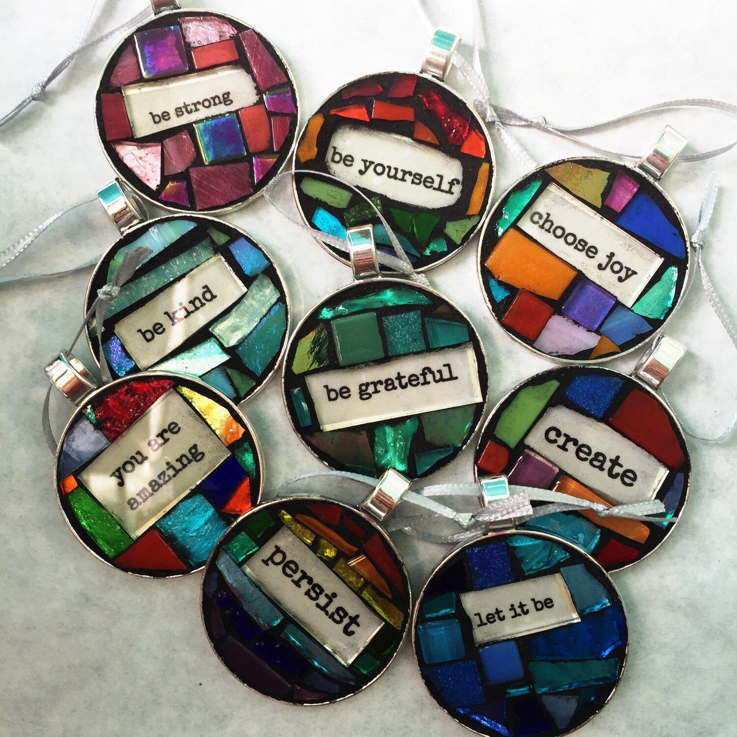 mini mosaics on metal base