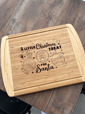 A Little Christmas Treat for Santa cutting board