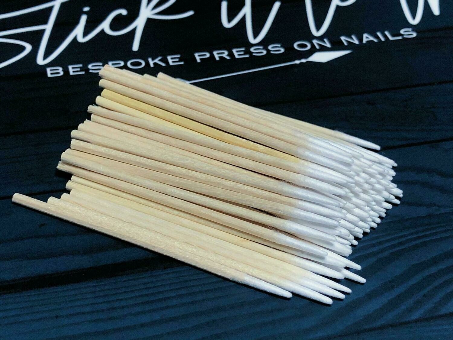 Cotton tipped wooden manicure corrector and under nail cleaner