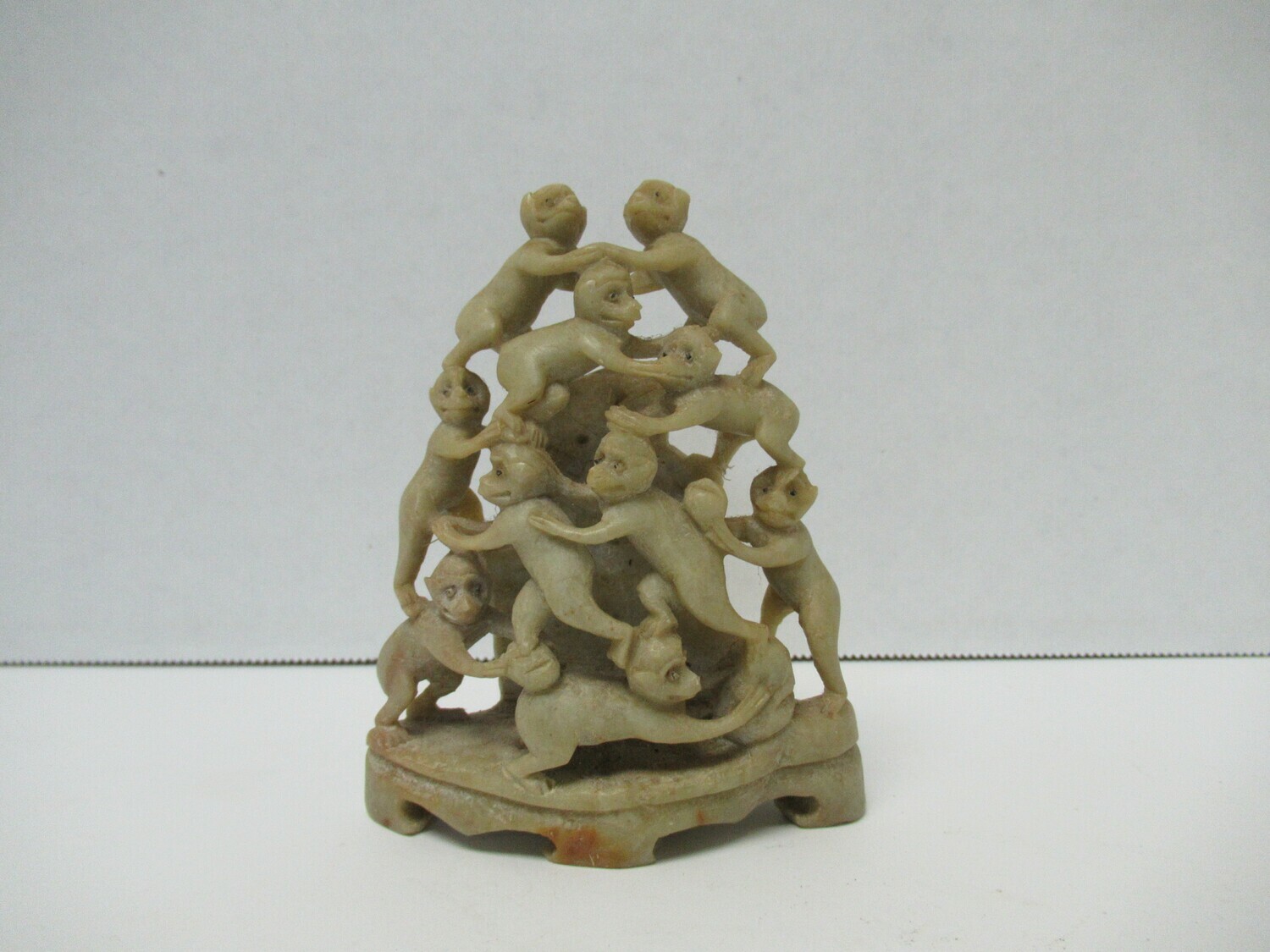 Hand Carved Soapstone Ten Monkeys Statue