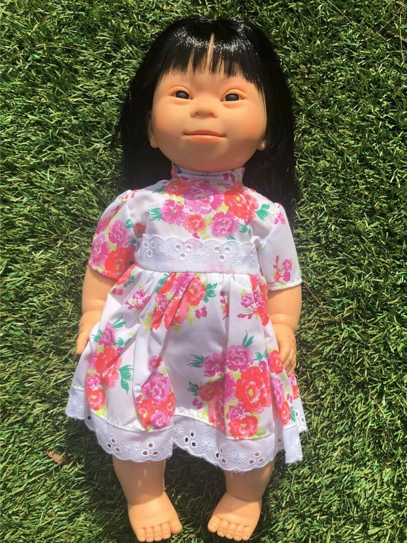 Doll with Down Syndrome facial features