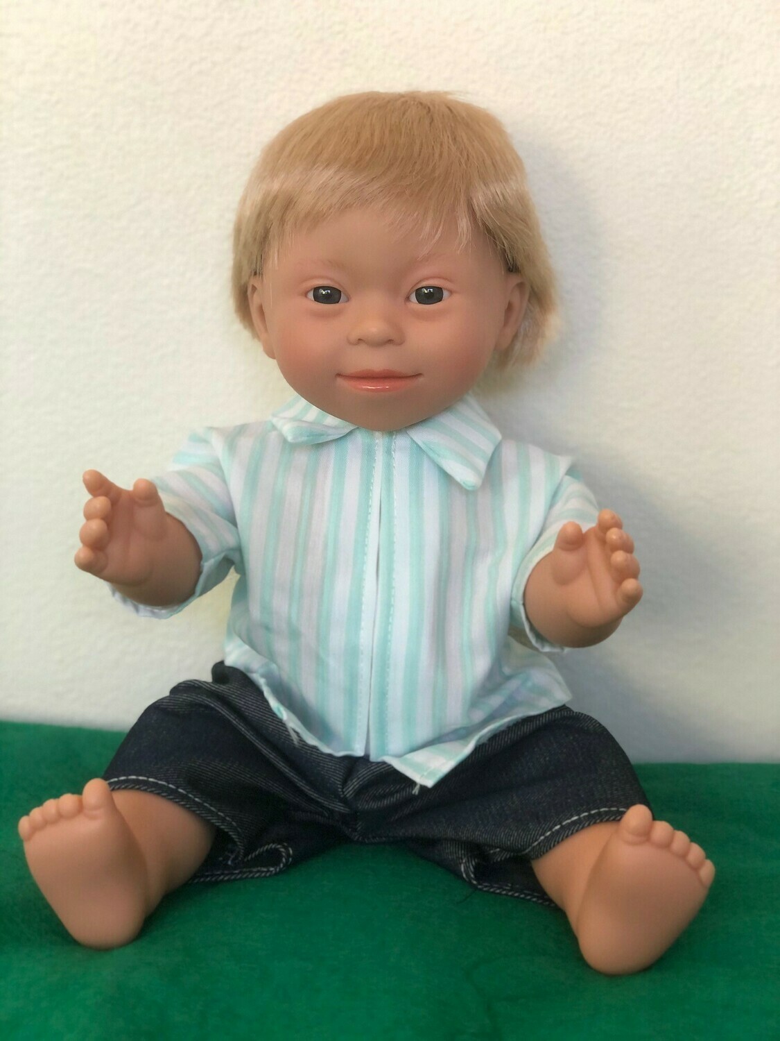 Doll with Down Syndrome facial features