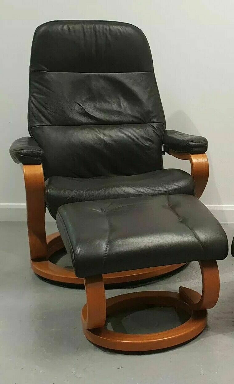Himolla Stressless swivel recliner leather chair and Stool in Brown