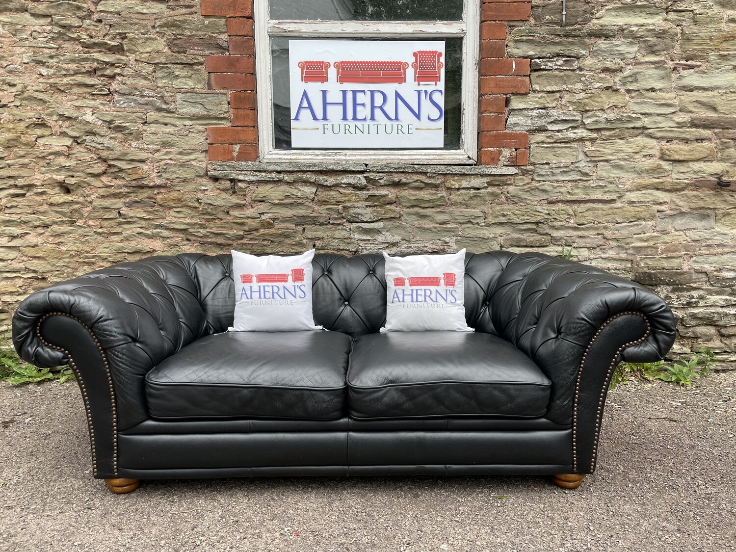 Black Leather Chesterfield sofa made by Sofology from their Stamford range,
