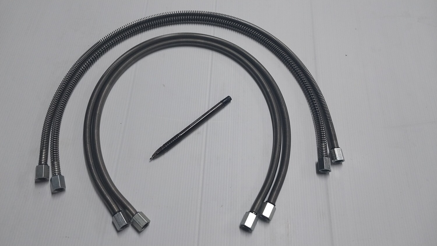 Spring Steel Reinforced Micro Quick and Tilt Hitch Hydraulic Hoses 630 bar Working Pressure