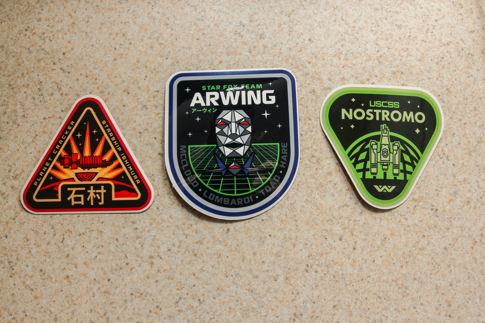 Fictional Space Mission Patch stickers I had printed recently r