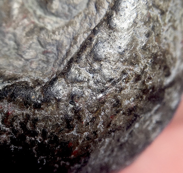 Close Up Macro Image of Muan Sarn Sacred Powders of  Khun Phaen Pim Bai Sema Amulet Edge Segment