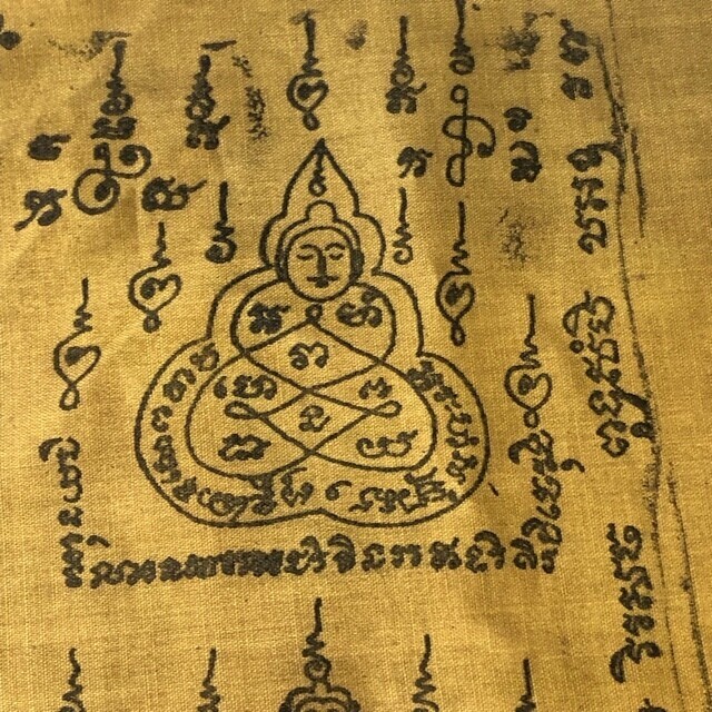 Yant with meaning of I believe in the Buddha in the Center of the Lotus