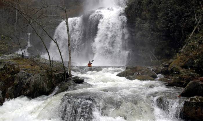 Kayaker Beneath Waterfall In River, Dam Demolished