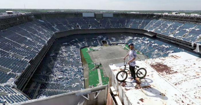 Stunt Biker Rides Abandoned NFL Stadium