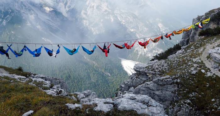 Dozing Daredevils: Hammocks Gather Over Mountain Chasm