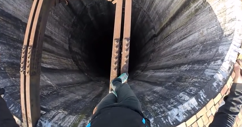 Man Climbs Sketchy Ladder Up Crumbling Chimney | GearJunkie