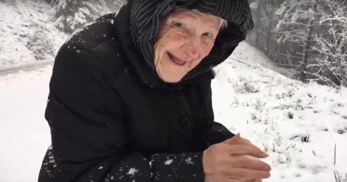 101-Year-Old Woman Delights In A Snowball