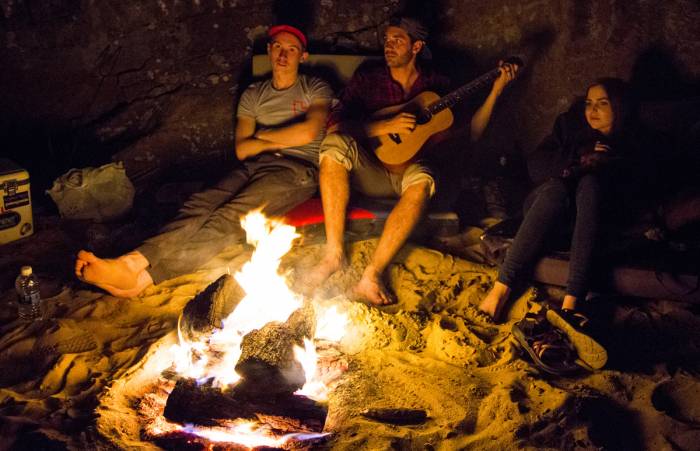 guitar at campfire singing
