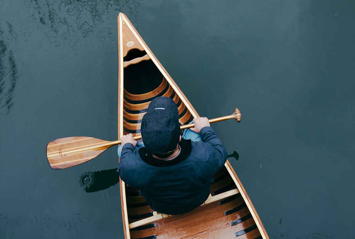 paddling a canoe
